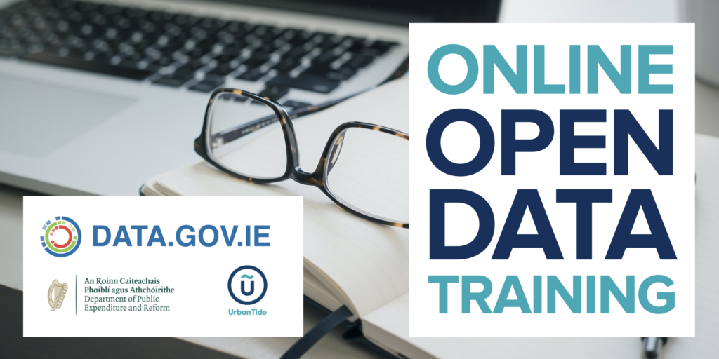 online open data training logo with laptop, glasses and notepad on a desk