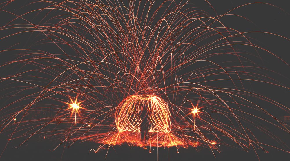 fire drawing with sparklers orange and black