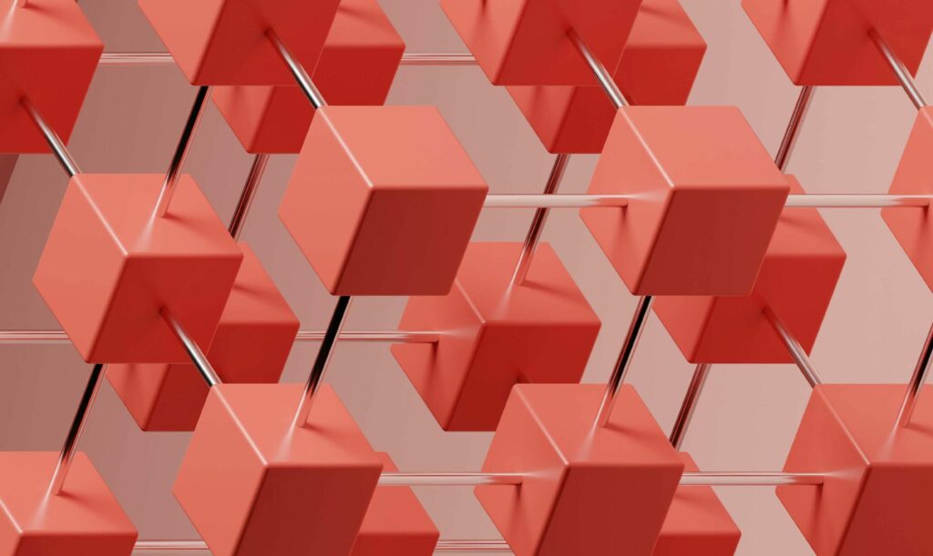 a structure of orangey red cubes connected by silver metal rods