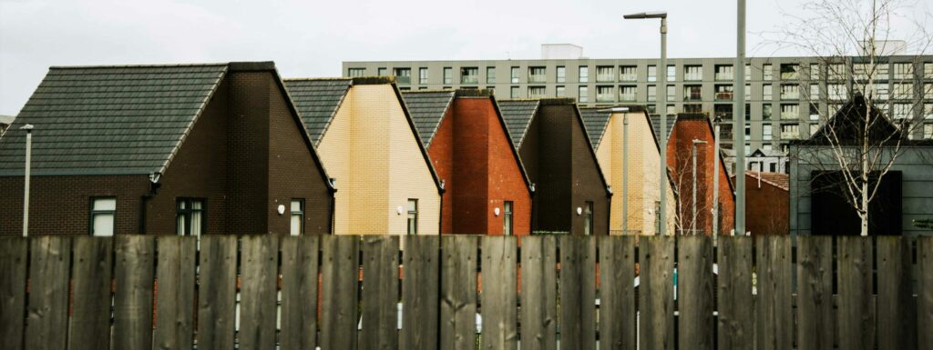 houses and grey block of flats