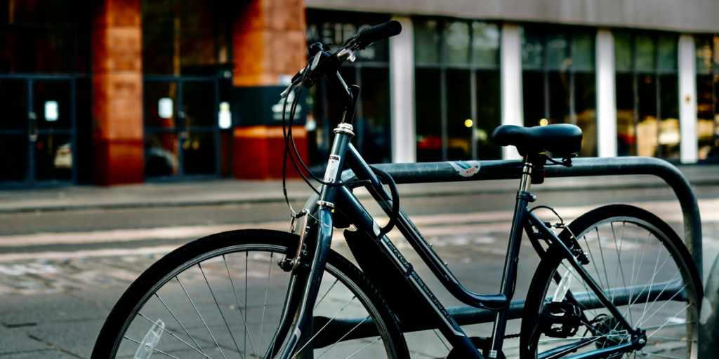 Black bike parked in Glasgow